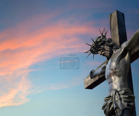 Photo for Abstract sacred saint divin rescue prayer dead man person lord messiah passion pain spirit life. Holy forgive devot dark wood church grave tomb statue icon sign light red cloudy even heaven text space - Royalty Free Image