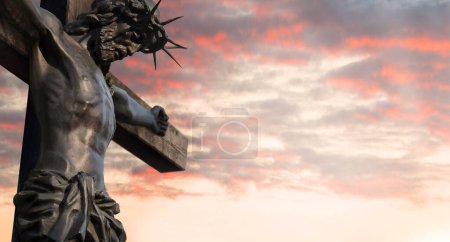 Photo for Abstract sacred saint divin rescue prayer dead man person lord messiah passion pain spirit life. Holy forgive devot dark wood church grave tomb statue icon sign light red cloudy even heaven text space - Royalty Free Image