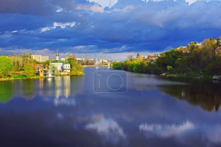 Photo for Beautiful view of cityscape in the summer. Church of Blessed Xenia of St. Petersburg  on the riverbank of the river Southern Bug in Vinnytsia, Ukraine - Royalty Free Image