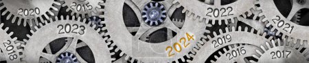 Photo for Photo of tooth wheel mechanism with numbers 2024, 2023, 2022 imprinted on metal surface. New Year concept. - Royalty Free Image