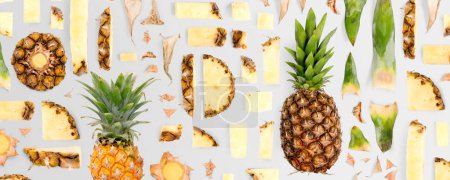 Photo for Pineapple fruit piece, slice and leaf collection. Flat lay, seamless abstract, isolated on gray background. - Royalty Free Image
