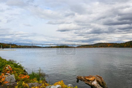 Photo for CATSKILL, NEW YORK - 18 OCT 2022: The Rip Van Winkle Bridge, a 5,040 ft cantilever bridge spanning the Hudson River between Hudson and Catskill, NY - Royalty Free Image