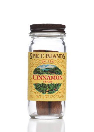 Photo for IRVINE, CALIFORNIA - 15 DEC 2022: A bottle of Spice Islands Cinnamon Sticks, derived from the dried inner bark of the tropical cassia tree - Royalty Free Image
