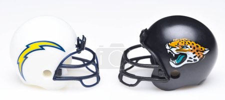Photo for IRVINE, CALIFORNIA - 9 JAN 2023: Helmets for the Los Angeles Chargers and Carolina Panthers, opponents in the NFL Wild Card Game. - Royalty Free Image