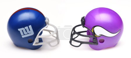 Photo for IRVINE, CALIFORNIA - 9 JAN 2023: Helmets for the New York Giants and Minnesota Vikings, opponents in the NFL Wildcard Game. - Royalty Free Image