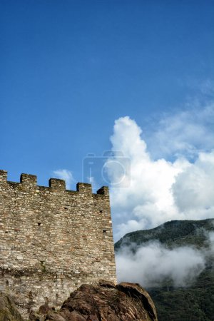 Photo for Closeup of Castelgrande with clouds and hillside, in the capital city of southern Switzerlands Ticino canton - Royalty Free Image