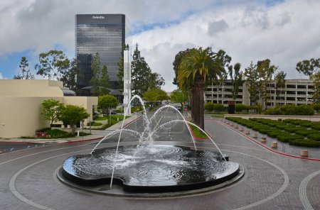 Photo for COSTA MESA, CALIFORNIA - 5 MAY 2023: View from Segerstrom Hall  looking up Town Center Drive towards South Coast Plaza. - Royalty Free Image