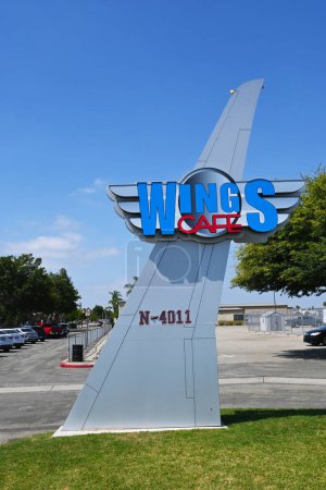 Photo for FULLERTON, CALIFORNIA - 13 SEPT 2023: The Wings Cafe sign at Fullerton Municipal Airport. - Royalty Free Image