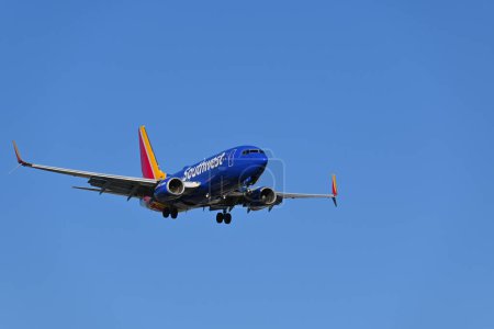 Photo for SANTA ANA, CALIFORNIA - 1 NOV 2023: Southwest Airlines 737 on approach to John Wayne Airport (SNA), Orange County, California. - Royalty Free Image
