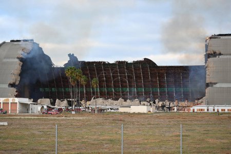 Photo for TUSTIN, CALIFORNIA - 7 NOV 2023: The MCAS Tustin Blimp Hangar on fire. - Royalty Free Image