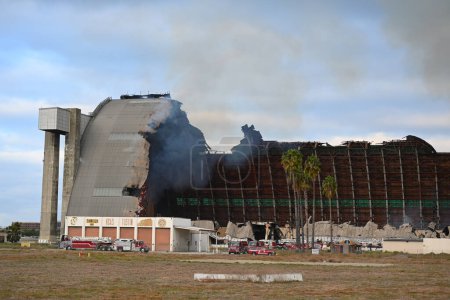 Photo for TUSTIN, CALIFORNIA - 7 NOV 2023: The Tustin MCAS Blimp Hangars fire. - Royalty Free Image