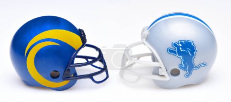 Photo for IRVINE, CALIFORNIA - 11 Jan 2024: Football helmets of the LA Rams and the Detroit Lions opponents in the Wild Card Round of the playoffs. - Royalty Free Image