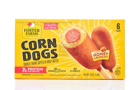 Photo for IRVINE, CALIFORNIA - 28 MAR 2024: A box of Foster Farms Corn Dogs, Honey Crunch Chicken Franks on a stick. - Royalty Free Image