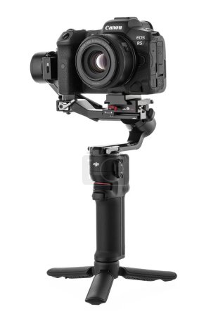 Photo for Varna, Bulgaria - February 17 ,2023: Canon R5 and DJI Ronin 3 mini is Three-Axis Motorized Gimbal Stabilizer for DSLR or Mirrorless Cameras manufactured by DJI company ,isolated on white. - Royalty Free Image