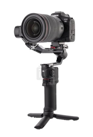 Photo for Varna, Bulgaria - February 17,2023: Canon R5 and DJI Ronin 3 mini is Three-Axis Motorized Gimbal Stabilizer for DSLR or Mirrorless Cameras manufactured by DJI company ,isolated on white. - Royalty Free Image
