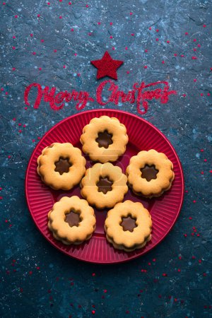 Photo for Merry christmas food background of Linzer cookies, jam biscuits seasonal holiday background - Royalty Free Image
