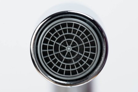 Plastic round aerator in faucet macro close up view