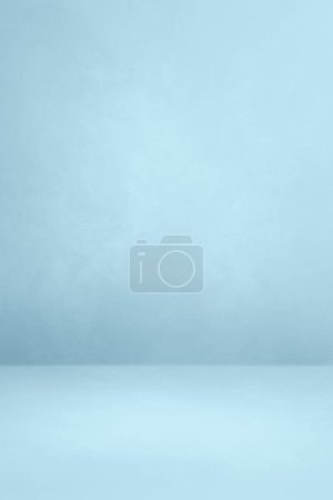 Foto de Light blue concrete interior background. Empty template scene. Vertical mockup - Imagen libre de derechos