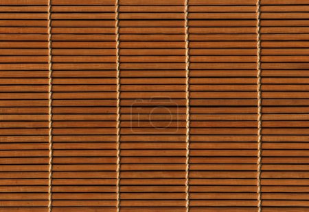 Téléchargez les photos : Brown Asian bamboo mat texture. Horizontal background wallpaper - en image libre de droit
