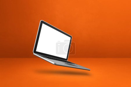 Téléchargez les photos : Ordinateur portable vierge flottant sur un fond orange. Illustration 3D isolée. Modèle horizontal - en image libre de droit