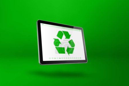 Foto de Tablet PC digital con un símbolo de reciclaje en la pantalla. concepto de conservación ambiental. Ilustración 3D aislada sobre fondo verde - Imagen libre de derechos