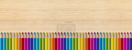 Foto de Conjunto de lápices de colores aislados sobre fondo de madera. Fondo de pantalla pancarta panorámica. - Imagen libre de derechos