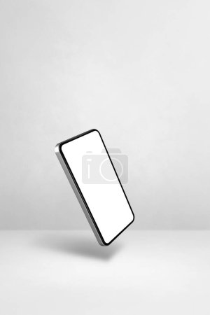 Téléchargez les photos : Smartphone vide flottant sur un fond blanc. Illustration 3D isolée. Modèle vertical - en image libre de droit