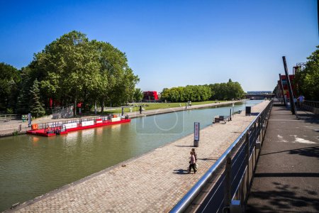 Photo for Paris - France - June 05, 2023 : Parc de la Villette and Ourcq canal in summer - Royalty Free Image