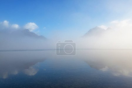 Photo for Beautiful Bowman lake with reflection of the spectacular mountains in Glacier National Park, Montana, USA. - Royalty Free Image