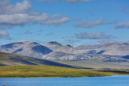 Photo for Beautiful blue lake in polar tundra along Dempster highway, Yukon, Canada - Royalty Free Image
