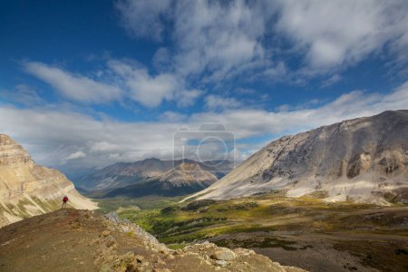 Photo for Hiking man in Canadian mountains. Hike is the popular recreation activity in North America. There are a lot of picturesque trails. - Royalty Free Image