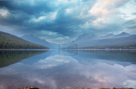 Photo for Beautiful Bowman lake with reflection of the spectacular mountains in Glacier National Park, Montana, USA. - Royalty Free Image