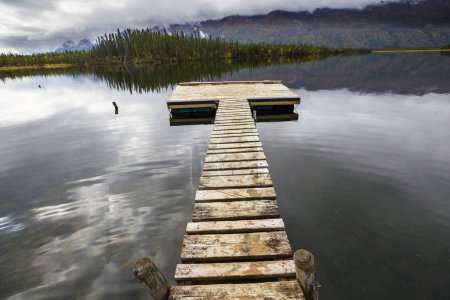 Photo for Wooden pier in serenity lake - Royalty Free Image