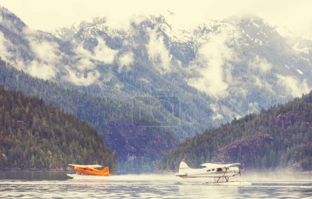 Photo for Float Plane in the mountains lake, Canada - Royalty Free Image