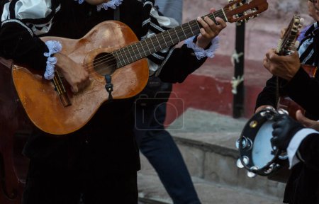Mexican musicians mariachi on the street of Mexico, historical Guanajuato city