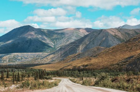 Photo for Endless Dempster Highway near the arctic circle, remote gravel road leading from Dawson City to Inuvik, Canada - Royalty Free Image