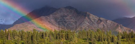 Photo for Rainbow above mountains. Beautiful natural landscapes. Picturesque nature. - Royalty Free Image