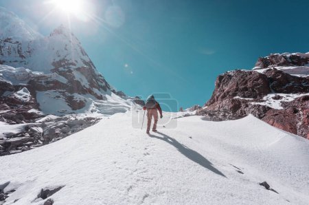 Foto de The climb in snowy mountains in the summer season - Imagen libre de derechos