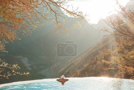 Tourist relaxing in natural thermal pools Las Grutas De Tolantongo in Mexico