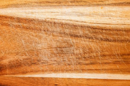 Photo for Worn wooden cutting board texture as background, top view - Royalty Free Image