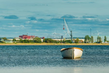 Photo for Moored empty fishing boat at Kattegat sea in Halmstad, Sweden. Selective focus. - Royalty Free Image