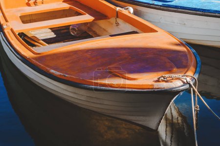 Téléchargez les photos : Fishing boats moored in small marina in town of Lovran, Croatia. Selective focus. - en image libre de droit