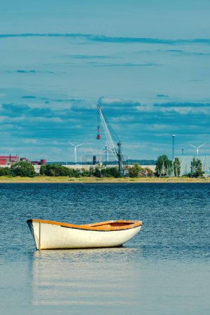 Photo for Moored empty fishing boat at Kattegat sea in Halmstad, Sweden. Selective focus. - Royalty Free Image
