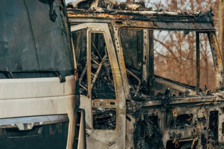 Photo for Semi truck engulfed by fire flames after traffic accident is burned and damaged, selective focus - Royalty Free Image