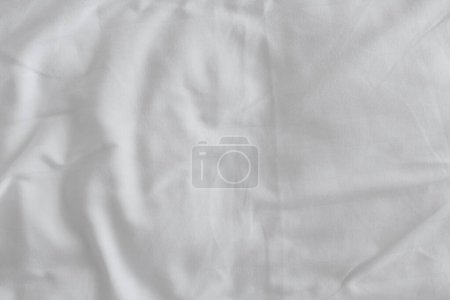 Photo for Texture of crumpled white bed sheets as background, top view - Royalty Free Image