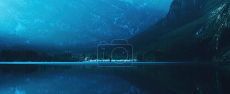 Photo for Ukanc, small settlement at western shore of Lake Bohinj in Slovenia surrounded by mountains Vogel and Vogar - Royalty Free Image