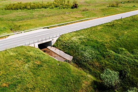 Photo for Highway overpass water canal in countryside, aerial shot from drone pov, high angle view, - Royalty Free Image