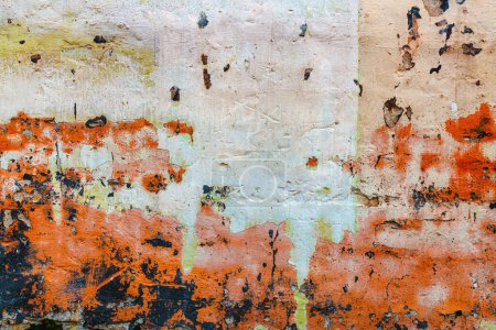 Photo for Old worn wall with paint peeling off the surface as grunge background and texture, copy space included - Royalty Free Image