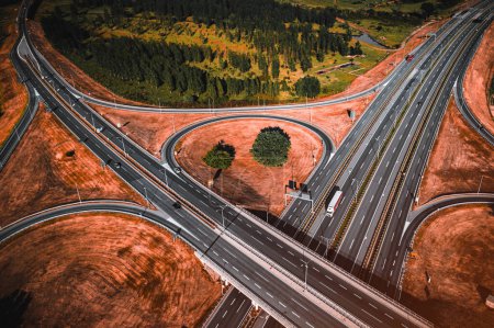 Photo for Clover leaf shaped highway interchange from drone pov, high angle view - Royalty Free Image