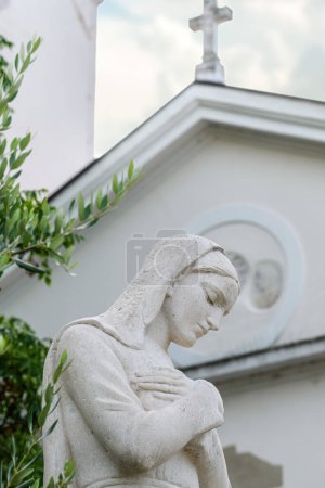 Photo for Crikvenica, Croatia - July 20, 2023: Virgin Mary statue in front of the Church of the Assumption of the Blessed Virgin Mary - Royalty Free Image